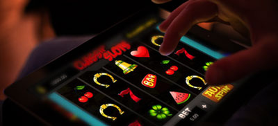 Online gambling Tablet with slots on it 